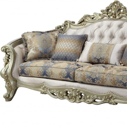 40" Antiqued White Velvet Curved Floral Sofa And Toss Pillows With Champagne Legs HomeRoots