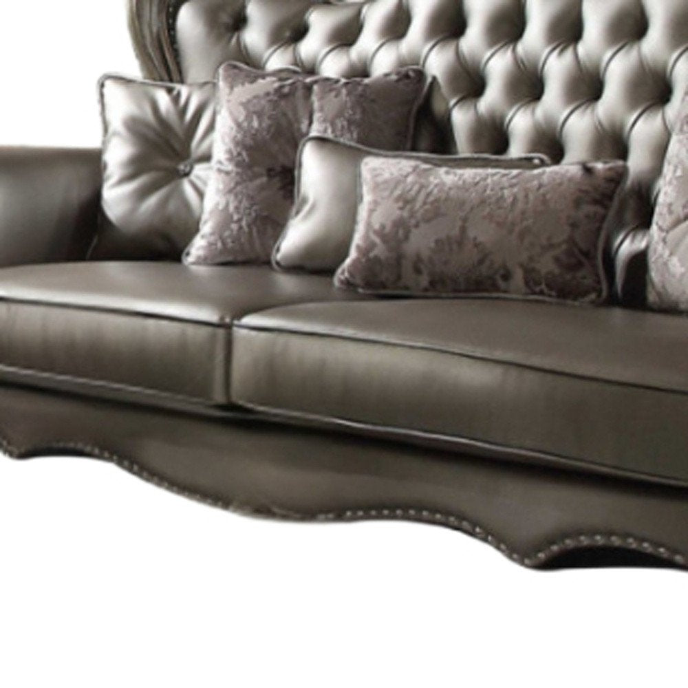 46" Platinum Faux Leather Curved Sofa And Toss Pillows HomeRoots