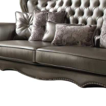 46" Platinum Faux Leather Curved Sofa And Toss Pillows HomeRoots