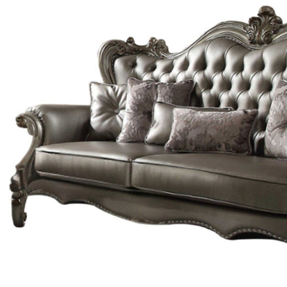 46" Platinum Faux Leather Curved Sofa And Toss Pillows HomeRoots