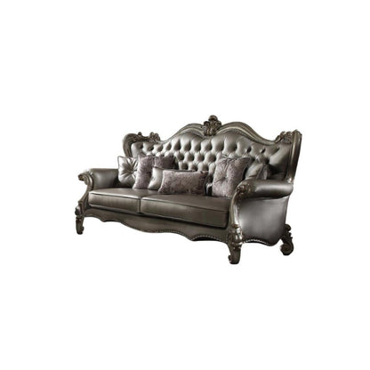 46" Platinum Faux Leather Curved Sofa And Toss Pillows HomeRoots