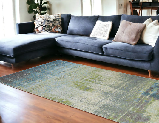 7' X 10' Blue and Green Area Rug - 94.0" (H) x 130.0" (W) x 0.5" (D)