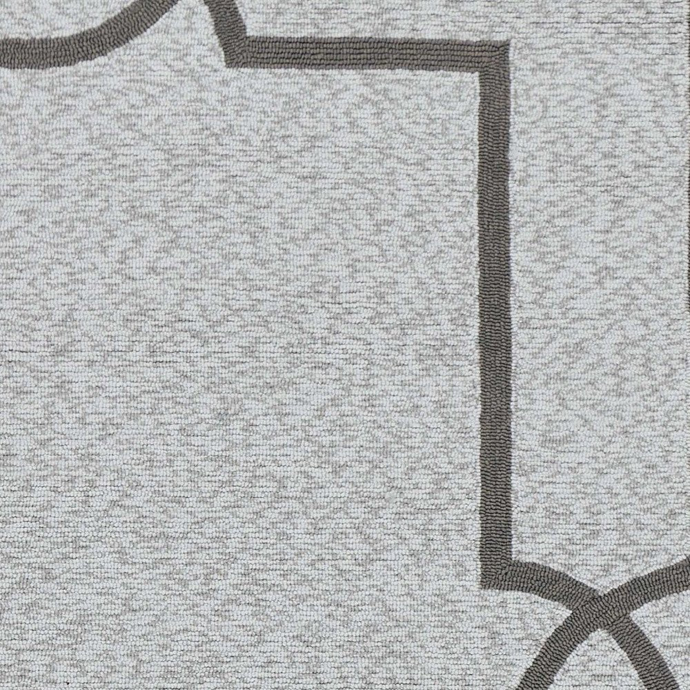 5' X 7' Ivory And Brown Geometric Handmade Indoor Outdoor Area Rug