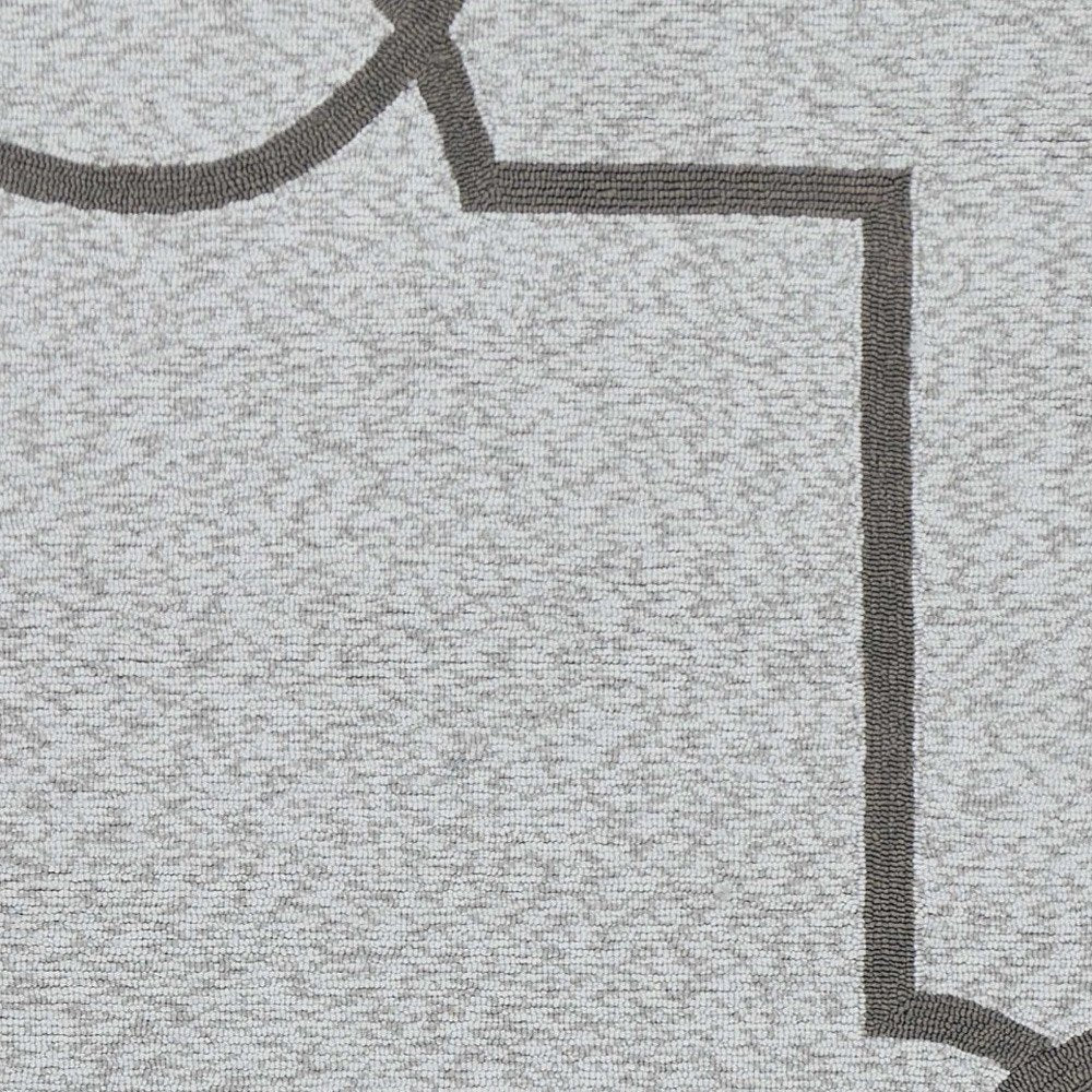 5' X 7' Ivory And Brown Geometric Handmade Indoor Outdoor Area Rug