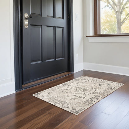 5'X8' Grey Machine Woven Distressed Floral Medallion Indoor Area Rug