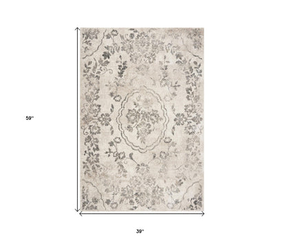 5'X8' Grey Machine Woven Distressed Floral Medallion Indoor Area Rug