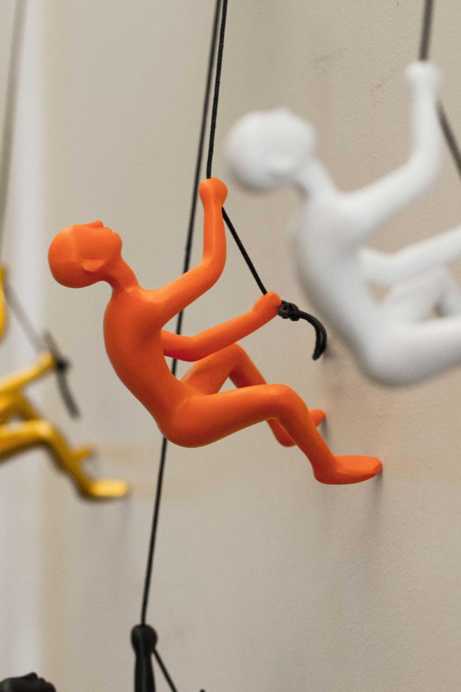 6" X 3" Orange Resin Climbing Man Hanging Dimensional Sculpture — view 2