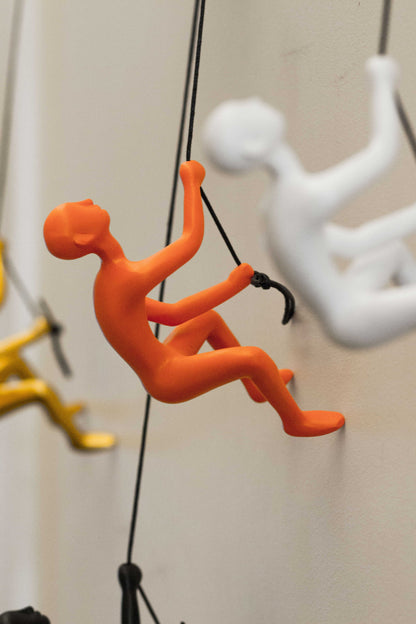 6" Orange Unique Climbing Man Wall Art