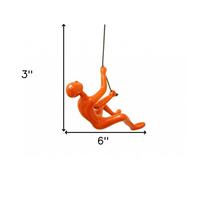 6" X 3" Orange Resin Climbing Man Hanging Dimensional Sculpture