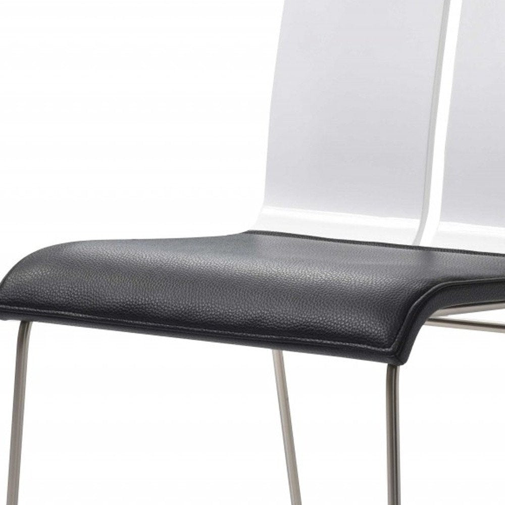 Set of Two Black and Silver Upholstered Faux Leather Dining Side Chairs HomeRoots