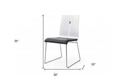 Set of Two Black and Silver Upholstered Faux Leather Dining Side Chairs HomeRoots