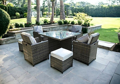 Nine Piece Clear and Gray Glass Dining Set HomeRoots