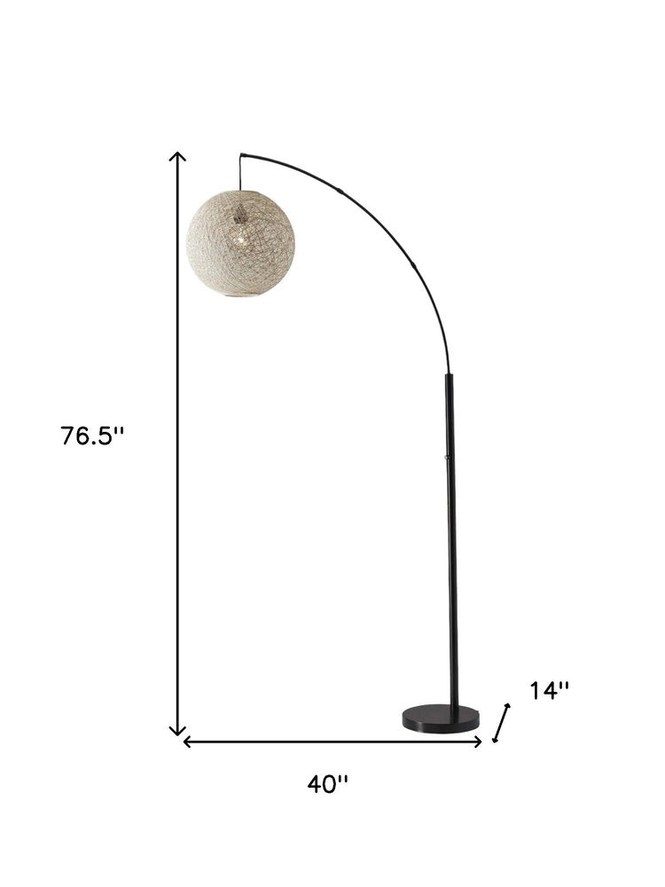 77" Antiqued Bronze Arched Floor Lamp With Groovy Beige Abstract Wicker Globe Shade — view 8