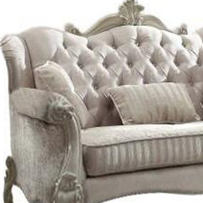 69" Ivory Polyester Blend Chesterfield Loveseat and Toss Pillows