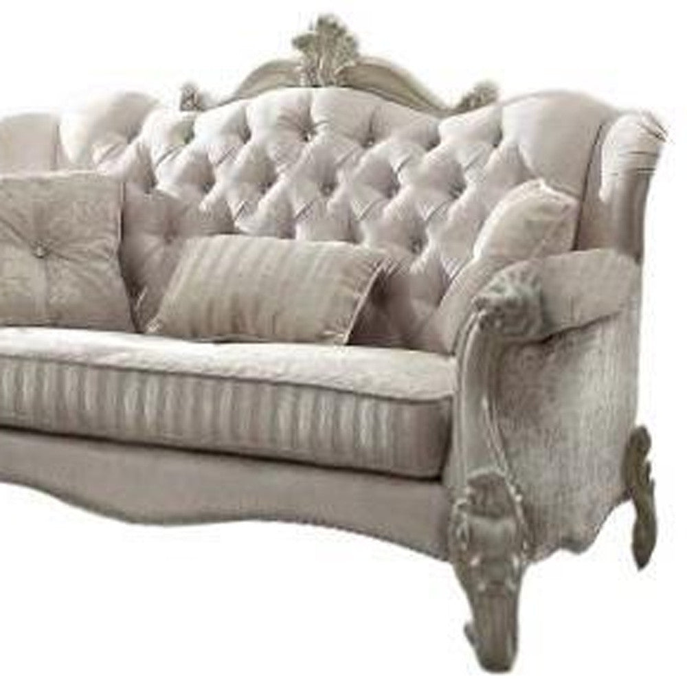 69" Ivory Polyester Blend Chesterfield Loveseat and Toss Pillows