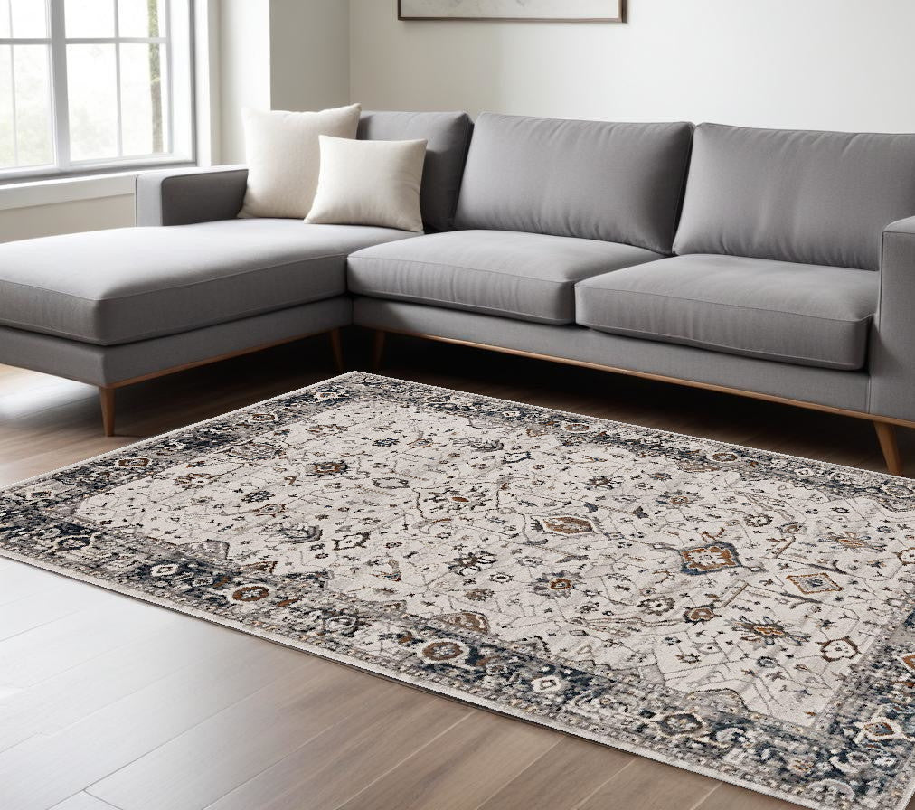 5' X 8' Ivory Grey Machine Woven Traditional Indoor Area Rug