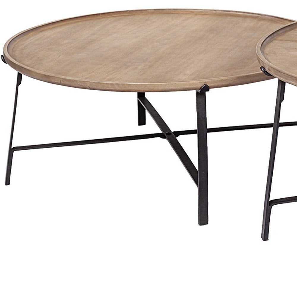 Set of Two Brown and Black Solid Wood and Iron Round Nested Coffee Tables HomeRoots