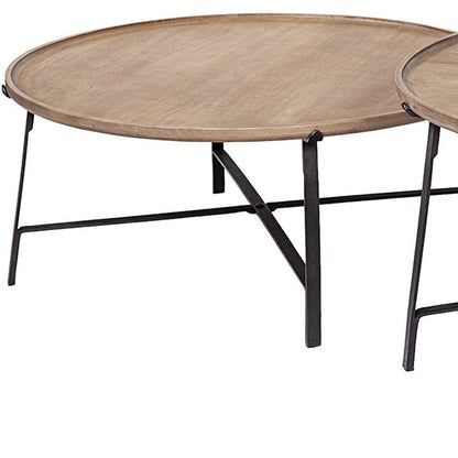 Set of Two Brown and Black Solid Wood and Iron Round Nested Coffee Tables HomeRoots