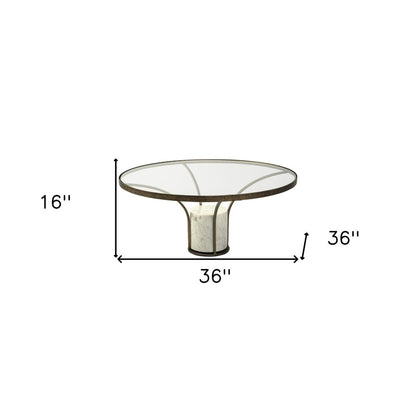 36" Antiqued Gold And White Glass Iron and Marble Round Pedestal Coffee Table HomeRoots