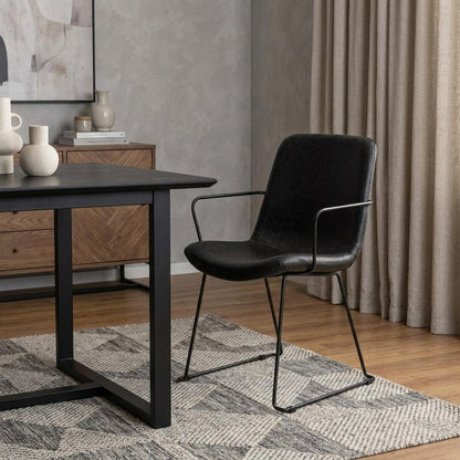 Black Upholstered Faux Leather Dining Arm Chair HomeRoots