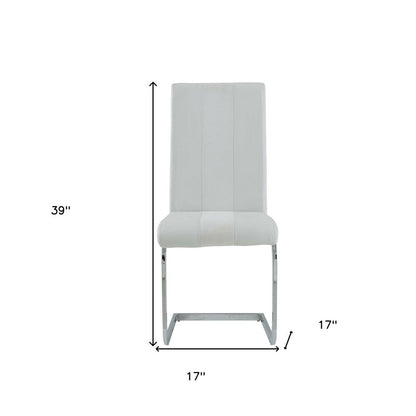 Set of Four White and Silver Upholstered Faux Leather Dining Side Chairs HomeRoots