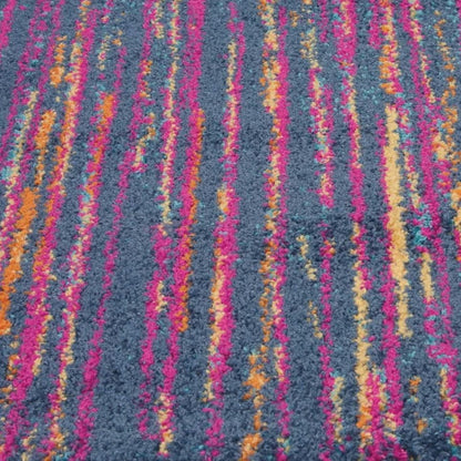 5' X 7' Blue And Pink Abstract Power Loom Area Rug