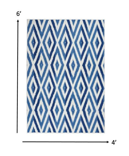 4' X 6' Blue And Ivory Geometric Dhurrie Area Rug