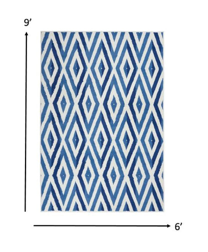 4' X 6' Blue And Ivory Geometric Dhurrie Area Rug