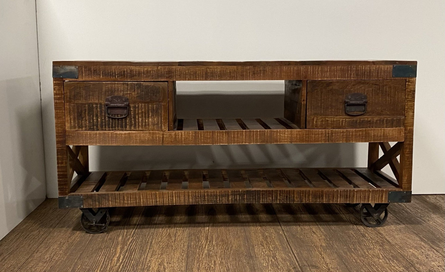 18" Brown and Black Solid Wood Distressed Wheel Console Table With Shelves And Drawers HomeRoots