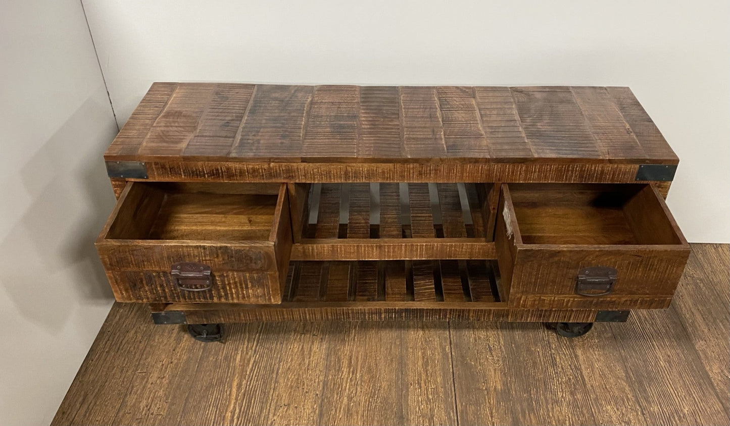 18" Brown and Black Solid Wood Distressed Wheel Console Table With Shelves And Drawers HomeRoots