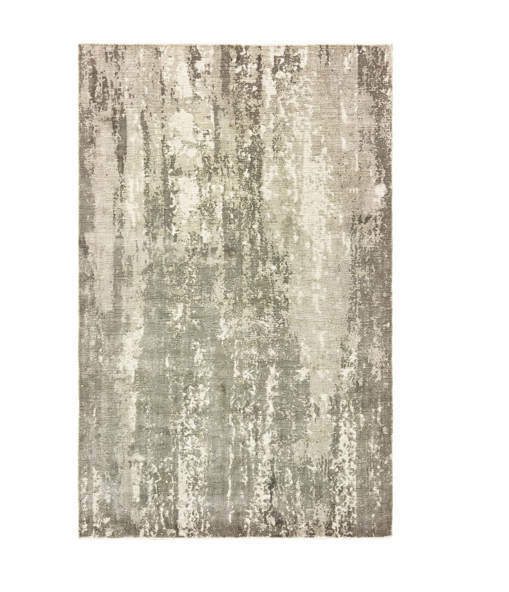 9' X 12' Gray And Ivory Abstract Splash Indoor Area Rug - 108.0" (H) x 144.0" (W) x 0.2" (D)