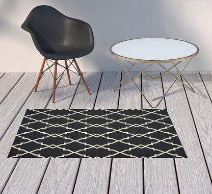 4' x 6' Black and Ivory Indoor Outdoor Area Rug