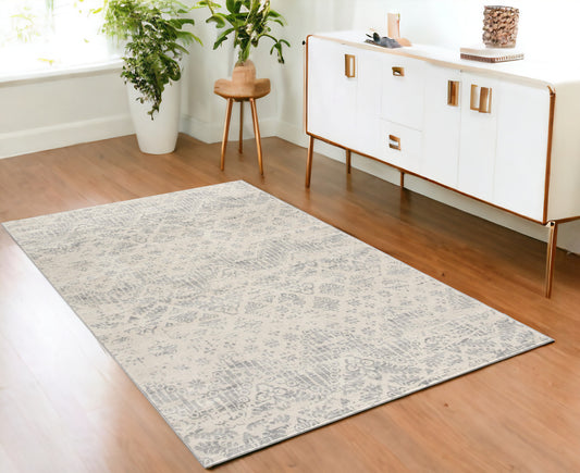 4' X 6' Ivory Distressed Ikat Pattern Area Rug - 45.0" (H) x 66.0" (W) x 0.4" (D)