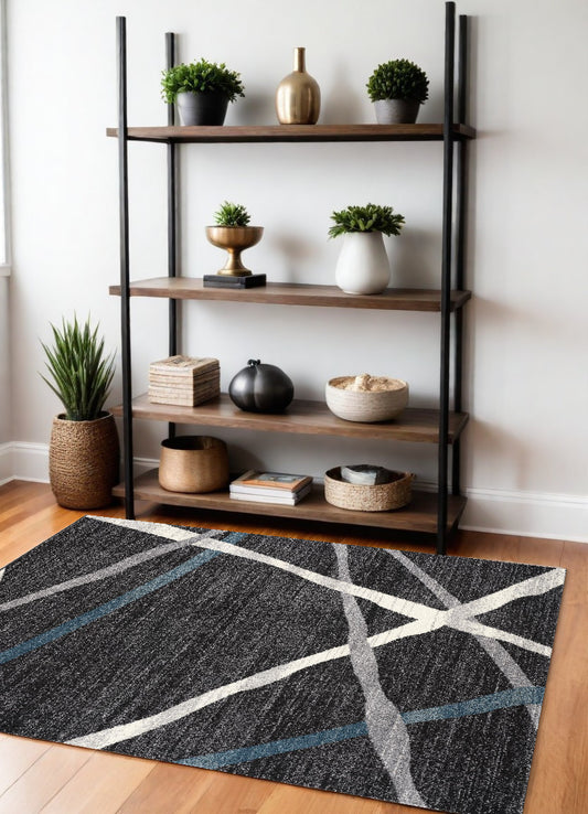 4' X 6' Distressed Black And Gray Abstract Area Rug - 45.0" (H) x 66.0" (W) x 0.8" (D)