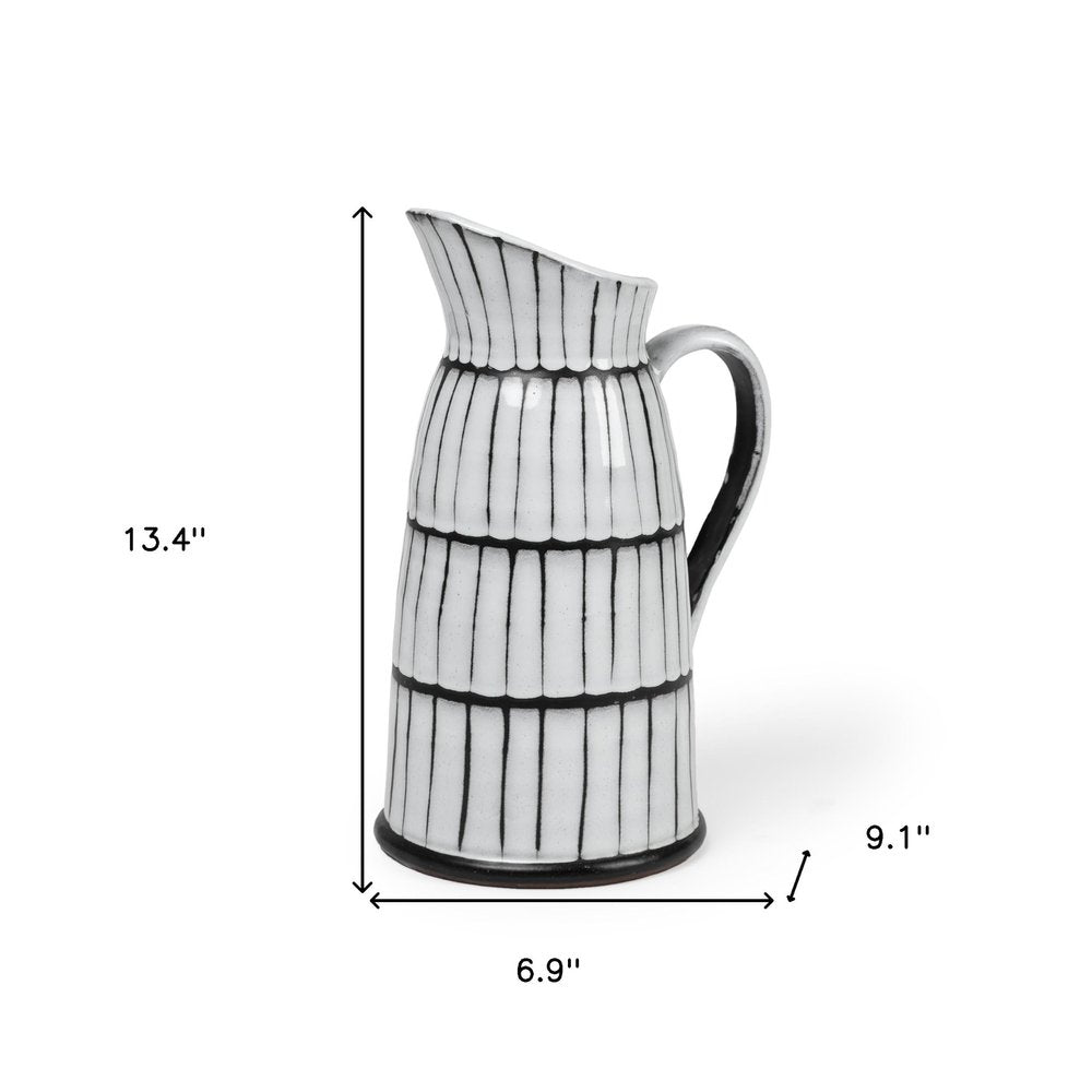 13" Black And White Ceramic Cylinder Jug Vase With Sculptural Details HomeRoots