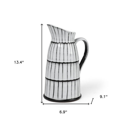 13" Black And White Ceramic Cylinder Jug Vase With Sculptural Details HomeRoots