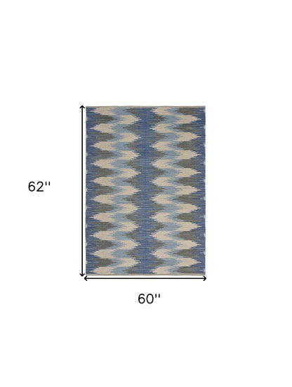 5’ x 7’ Blue and Cream Ikat Pattern Area Rug