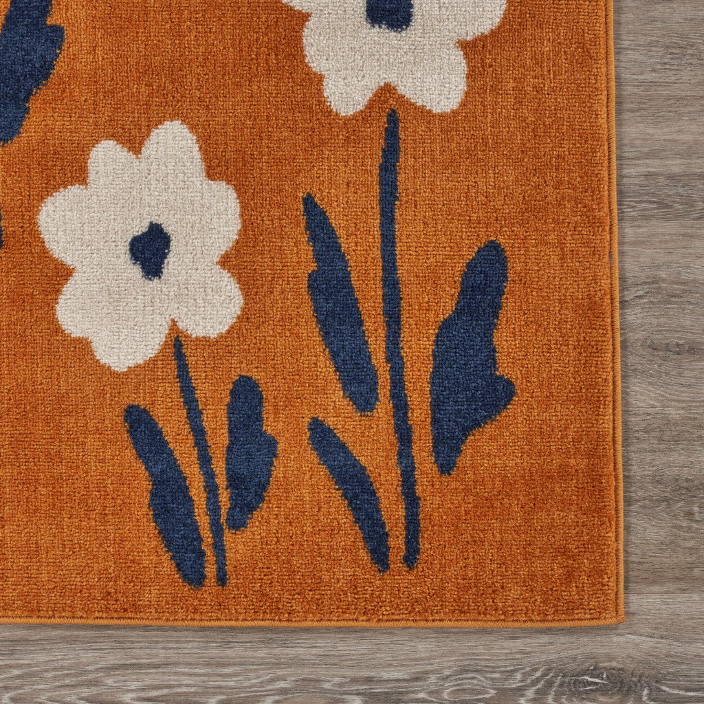 5’ x 7’ Orange and Ivory Flower Field Area Rug