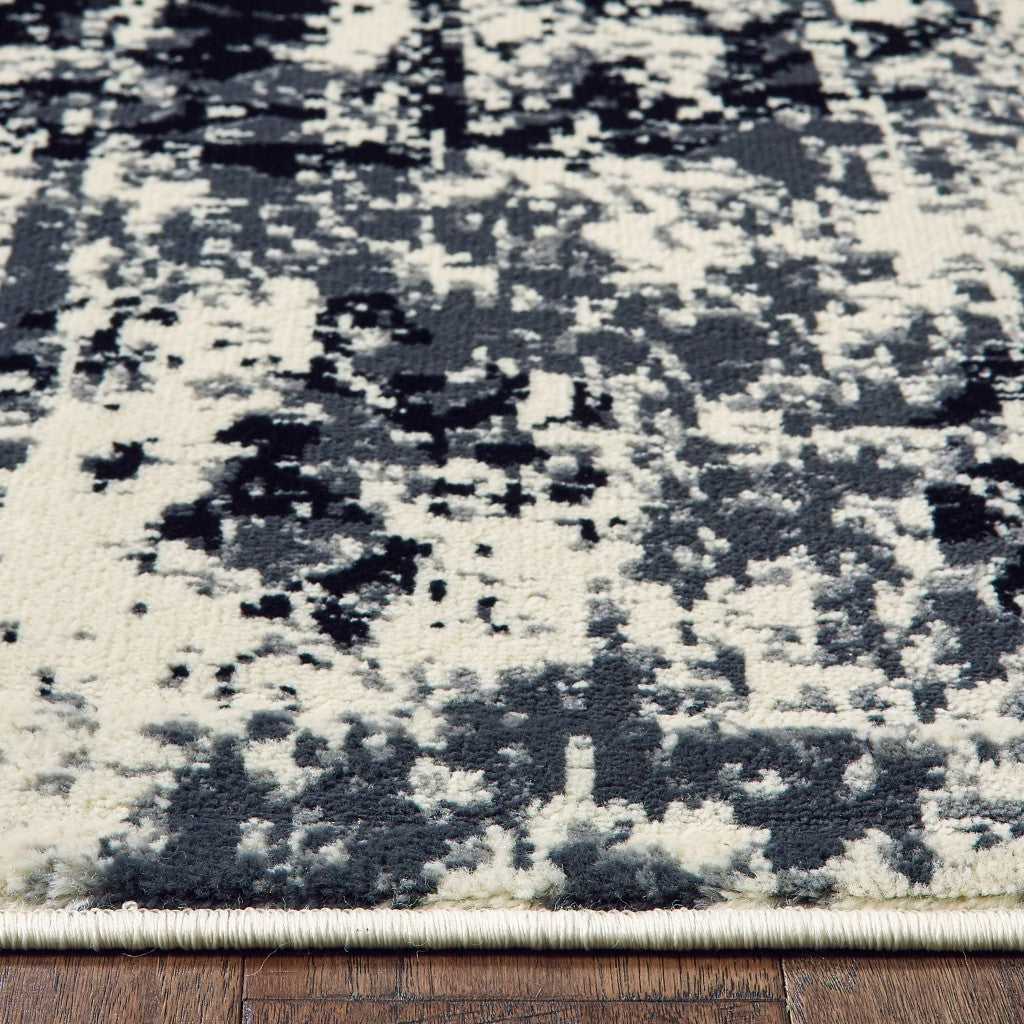 5’ x 7’ Black and White Abstract Area Rug