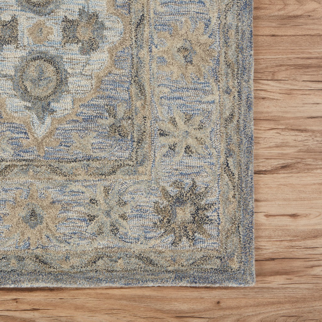 5’ x 8’ Blue and Tan Traditional Area Rug