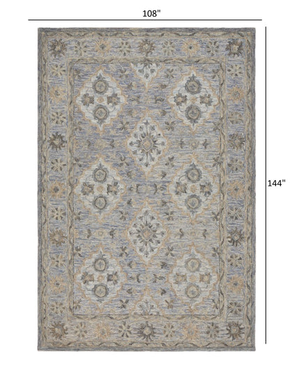 5’ x 8’ Blue and Tan Traditional Area Rug