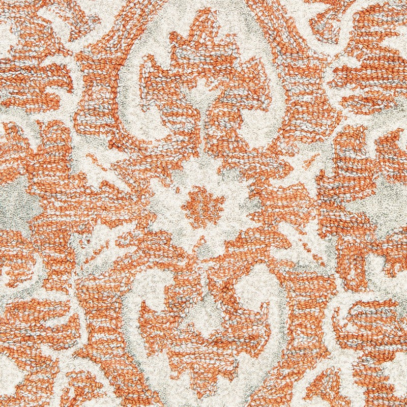 8’ x 10’ Orange and Ivory Medallion Area Rug