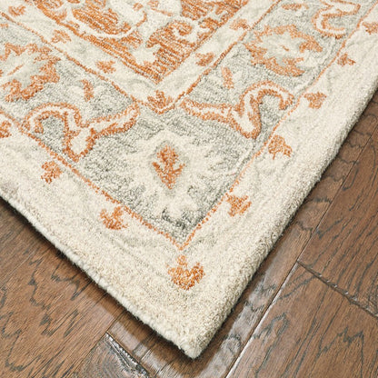 8’ x 10’ Orange and Ivory Medallion Area Rug