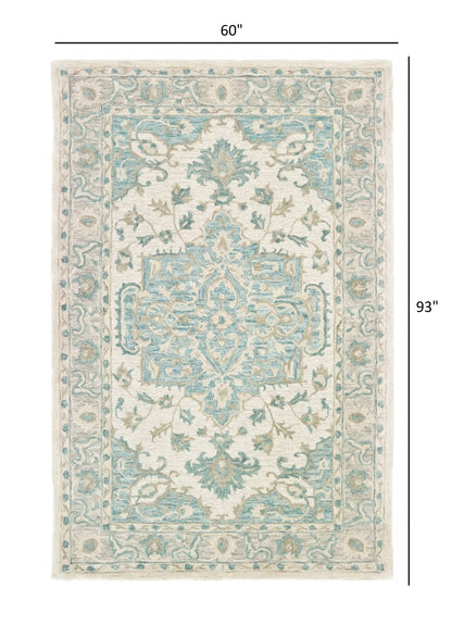 5’ x 8’ Turquoise and Cream Medallion Area Rug