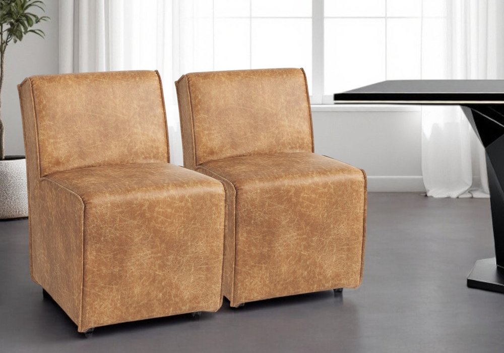Set of Two Brown Upholstered Faux Leather Dining Side Chairs With Wheels HomeRoots