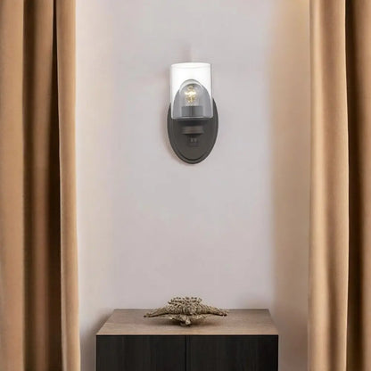 One Light Bronze Wall Light with Clear Glass Shade HomeRoots