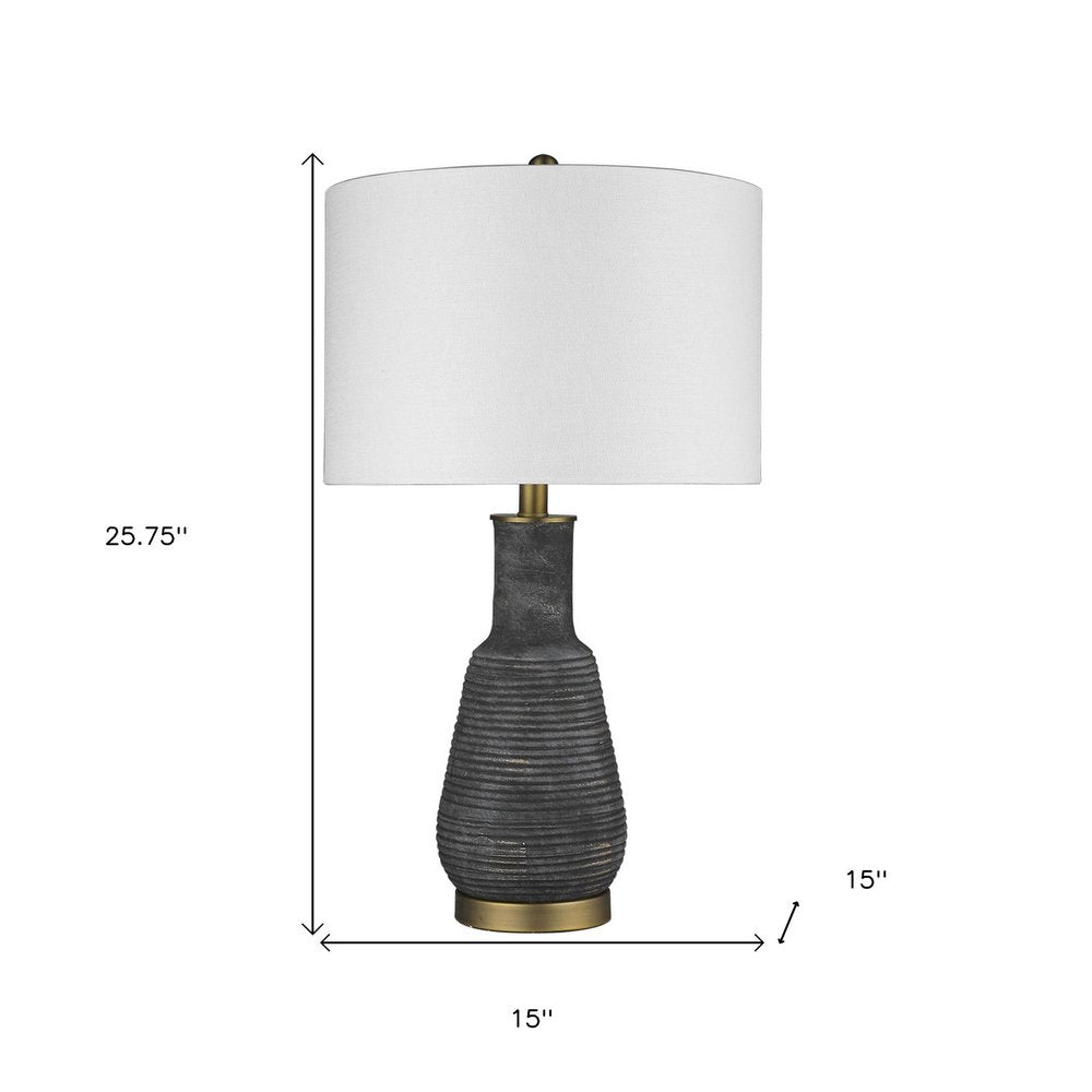 26" Distressed Black and Gold Ceramic Table Lamp With White Drum Shade HomeRoots