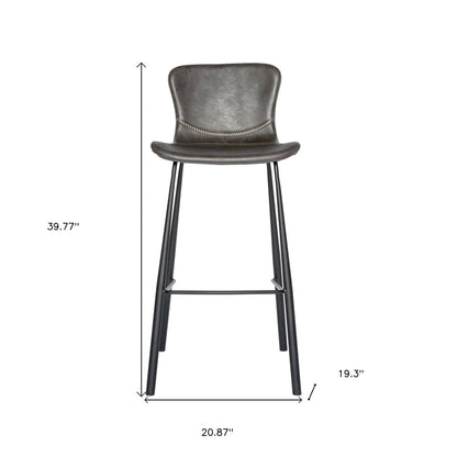 Set of Two 30" Gray And Black Faux Leather And Steel Low Back Bar Height Bar Chairs HomeRoots