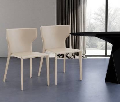 Set of Two Beige Upholstered Leather Curved Back Dining Side Chairs HomeRoots