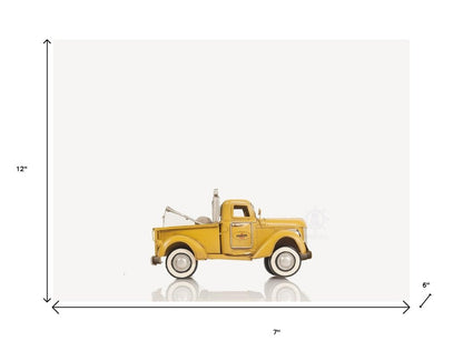7" Yellow Metal Hand Painted Model Car HomeRoots